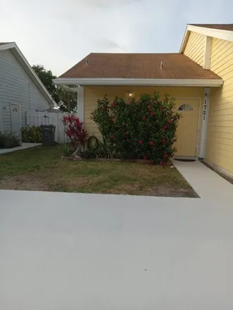 Buy this 1 bed townhouse on 1775 Royal Forest Court in Palm Beach County, FL 33406