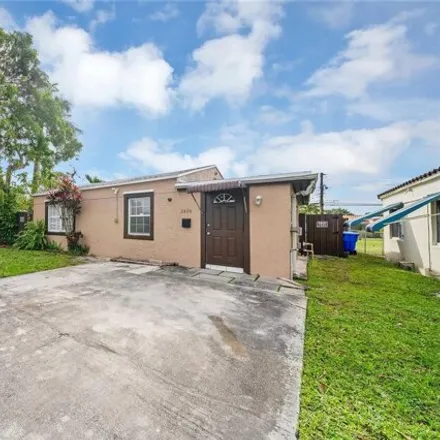 Rent this 3 bed house on 2404 Dewey Street in Hollywood, FL 33020