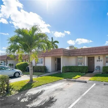 Buy this 2 bed house on 5775 Fernley Dr W Apt 107 in Palm Beach, Florida