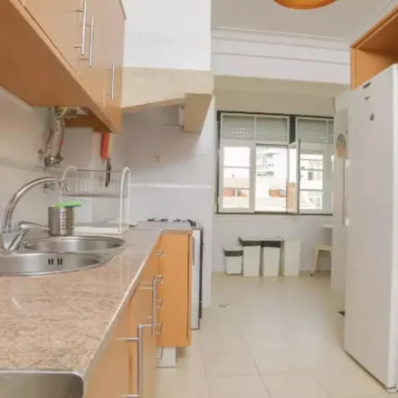 Rent this 6 bed apartment on Rua Actor Vale 51 in 1900-024 Lisbon, Portugal