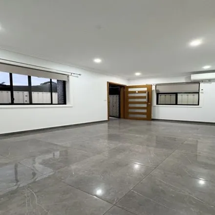 Rent this 3 bed apartment on Sharland Place in Smithfield NSW 2164, Australia