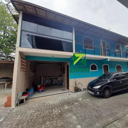 Buy this 4 bed house on Rua Epitácio Pessoa in Peixe Dourado II, Região Geográfica Intermediária de Macaé-Rio das Ostras-Cabo Frio - RJ
