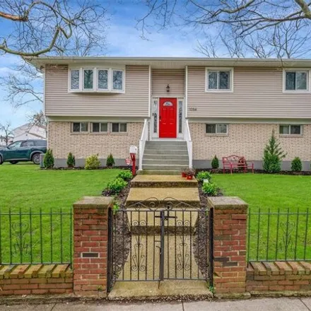 Buy this 4 bed house on 406 Scaneateles Avenue in West Hempstead, NY 11552