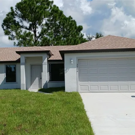Rent this 4 bed house on 2606 9th Street Southwest in Lehigh Acres, FL 33976