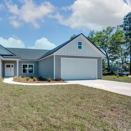 Rent this 4 bed house on 99 Blackberry lane in Crawfordville, FL 32327