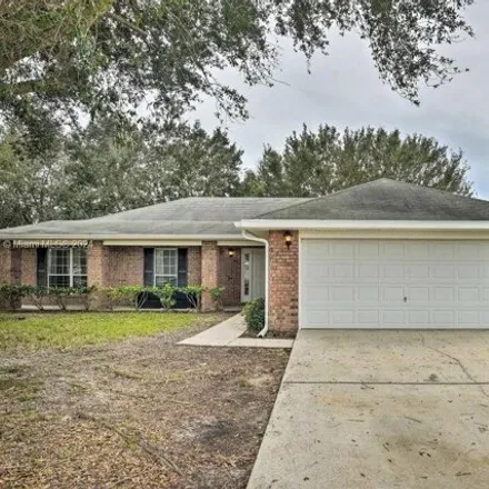 Rent this 4 bed house on 3256 Courtland Boulevard in Deltona, FL 32738