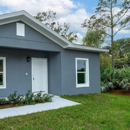 Buy this 4 bed house on 456 Tobias Street Southeast in Palm Bay, FL 32909