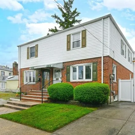Buy this 3 bed house on 247-11 87th Drive in New York, NY 11426