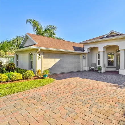 Buy this 3 bed house on 113 Arena Lake Drive in Palm Coast, FL 32137