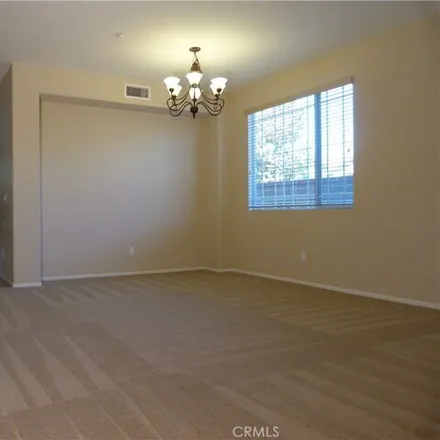 Rent this 3 bed house on 11166 Parkscape Drive in Riverside, CA 92515