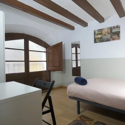 Rent this 4 bed room on Nømad Every Day in Carrer de Joaquín Costa, 26