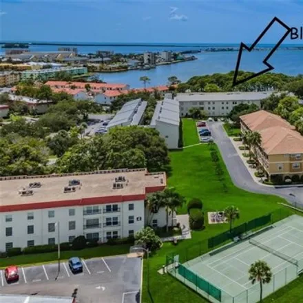 Rent this 2 bed condo on Bella Loop in Dunedin, FL 34660