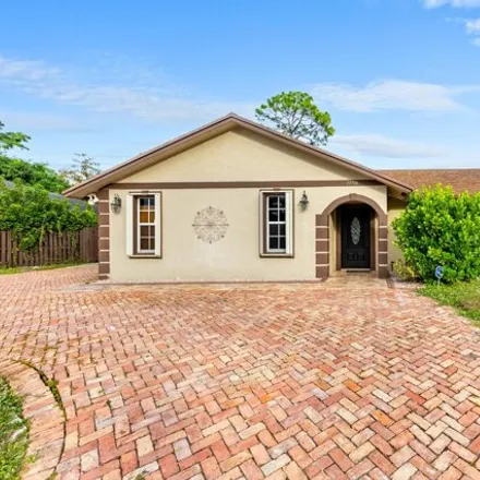 Rent this 3 bed house on 13714 Exotica Lane in Wellington, Palm Beach County