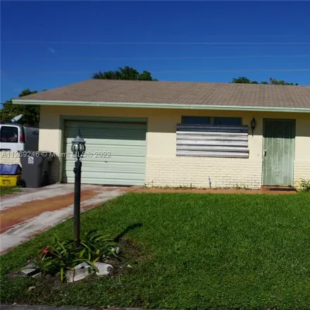 Buy this 2 bed house on 5971 Caribbean Boulevard in West Palm Beach, FL 33407