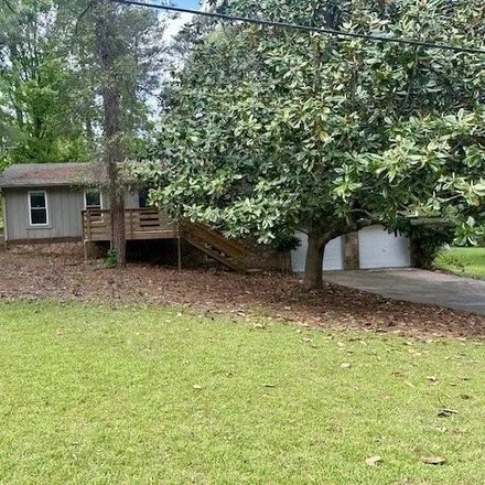 Buy this 3 bed house on 6226 Field Glen Rd in Stone Mountain, Georgia