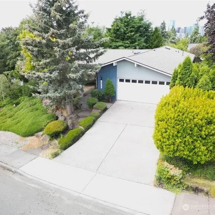 Rent this 4 bed house on 12112 SE 15th St in Bellevue, Washington
