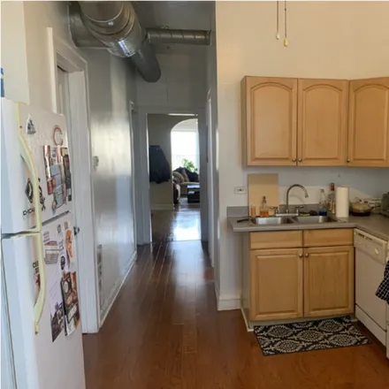 Rent this 3 bed apartment on 723 W Wrightwood Ave