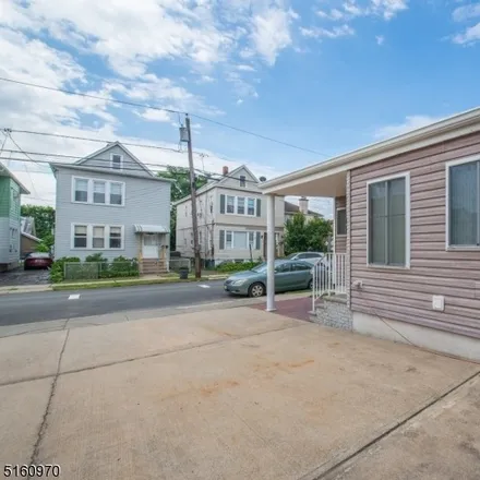 Buy this 3 bed house on 54 Division Avenue in Garfield, NJ 07026