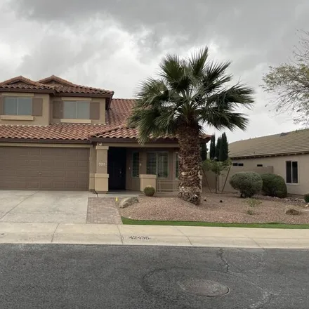 Rent this 4 bed house on 42467 West Desert Fairways Drive in Maricopa, AZ 85138