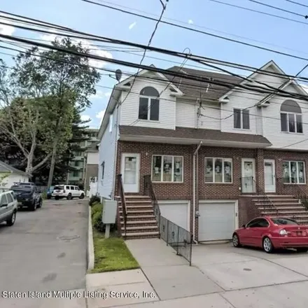 Rent this 3 bed house on 366 Union Avenue in New York, NY 10303
