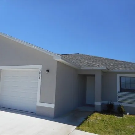 Rent this 3 bed house on Skyline Boulevard in Cape Coral, FL 33914