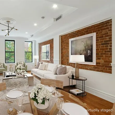 Buy this studio townhouse on 319 WEST 137TH STREET in Central Harlem