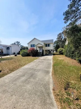 Buy this 4 bed house on 1402 Harrington Avenue in Kill Devil Hills, NC 27948