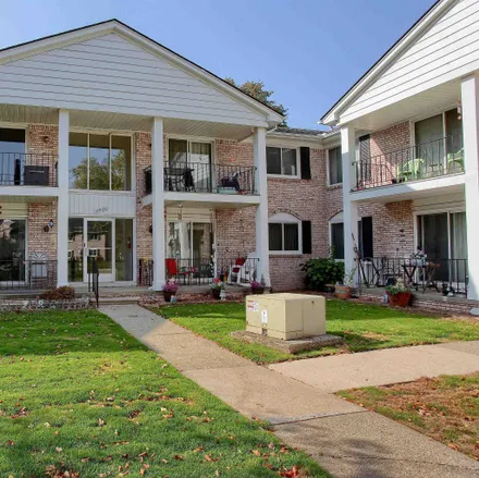 Rent this 2 bed condo on 13920 Camelot Drive in Sterling Heights, MI 48312