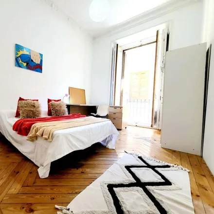Rent this 11 bed room on Calle de Guillermo Rolland in 3, 28013 Madrid