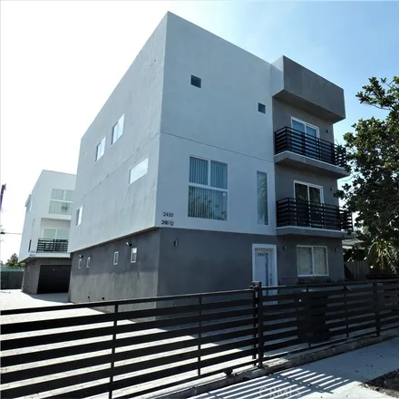Rent this 3 bed townhouse on 2400 Carmona Avenue in Los Angeles, CA 90016