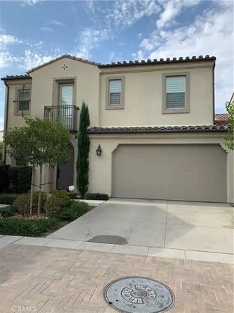 Rent this 4 bed condo on 139 Hollow Tree in Irvine, CA 92618