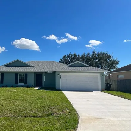 Rent this 4 bed house on 5245 Gamma Street in Port Saint Lucie, FL 34986