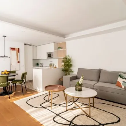 Rent this 4 bed apartment on Madrid in Bar La Taberna, Calle de Bailén
