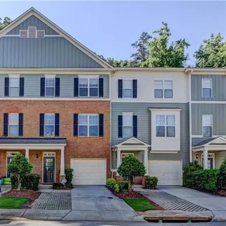 Rent this 3 bed townhouse on 1866 Oakbrook Lane Northwest in Kennesaw, GA 30152