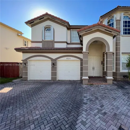 Rent this 5 bed house on 8324 Northwest 115th Court in Doral, FL 33178