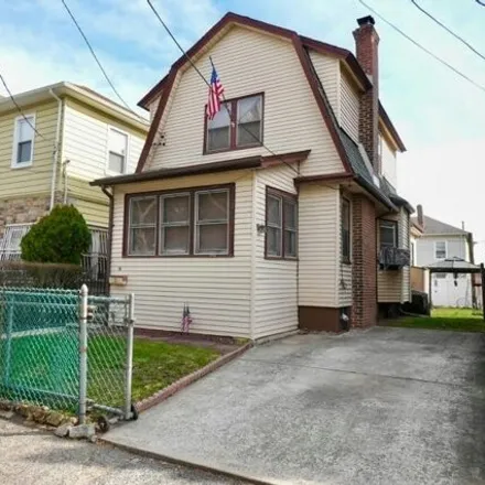 Buy this 3 bed house on 50 Honiss Place in Newark, NJ 07104