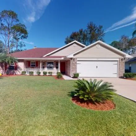 Buy this 3 bed apartment on 27 Raleigh Drive in Lehigh Woods, Palm Coast