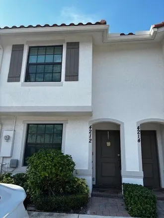 Rent this 2 bed house on 4242 Napoli Lake Drive in Riviera Beach, FL 33410