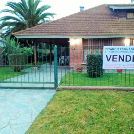 Buy this 3 bed house on Avenida 6 in Partido de Villa Gesell, 7165 Villa Gesell