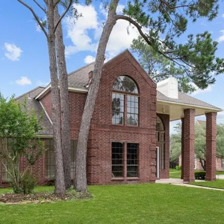 Buy this 5 bed house on 7712 Wilton Park Drive in Harris County, TX 77379