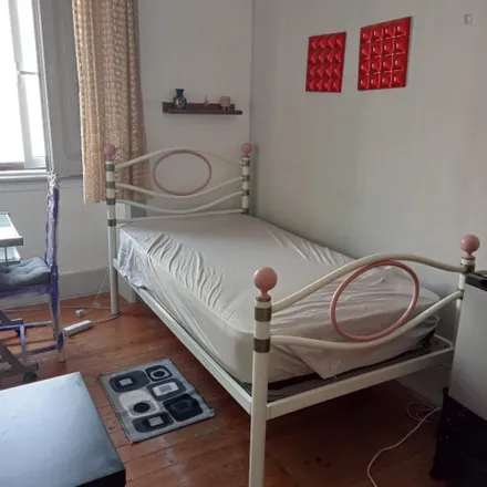 Rent this 4 bed room on Rua de Moçambique 24 in 1170-234 Lisbon, Portugal