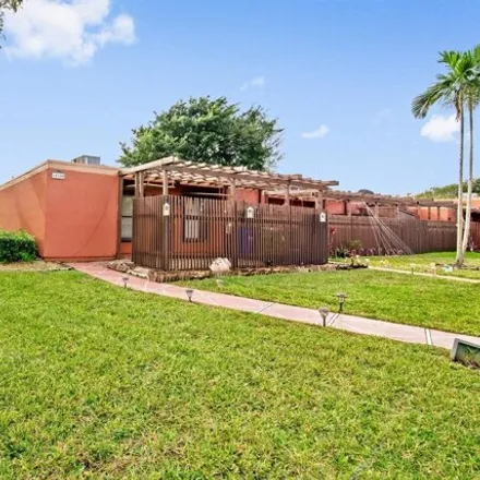 Rent this 3 bed house on 10304 Fairway Road in Pembroke Pines, FL 33026