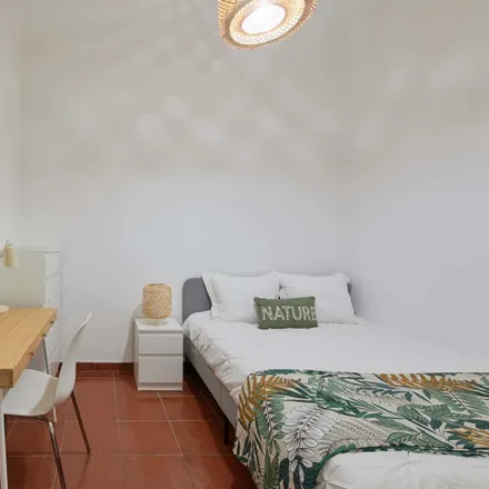 Rent this 6 bed room on Avenida Poeta Mistral in 1050-103 Lisbon, Portugal