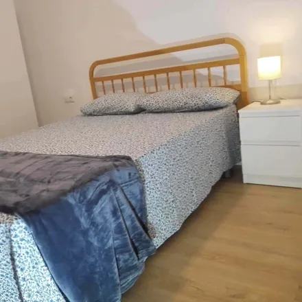 Rent this 3 bed room on Carrer d'Albocàsser in 25, 46020 Valencia