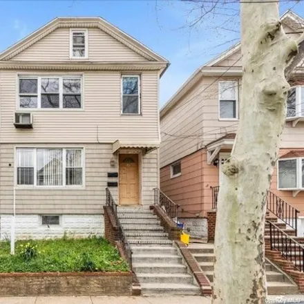 Buy this 5 bed house on 119-37 8th Avenue in New York, NY 11356