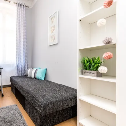 Rent this 4 bed room on Stanisława Wyspiańskiego 25 in 60-750 Poznań, Poland
