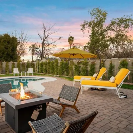 Rent this 4 bed house on 1716 West Berridge Lane in Phoenix, AZ 85015