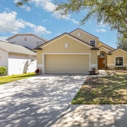Buy this 4 bed house on 1136 Bluegrass Drive in Groveland, FL 34736