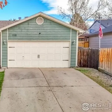 Buy this 4 bed house on West 64th Place in Arvada, CO 80003