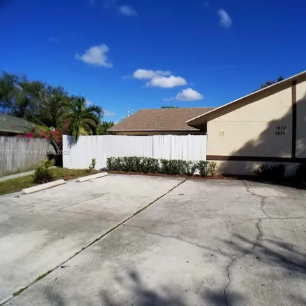 Buy this 2 bed house on 1674 Hawthorne Place in Wellington, Palm Beach County